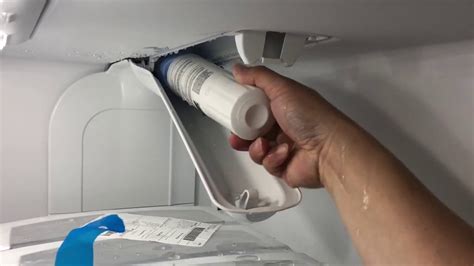 how to change the water filter on whirlpool refrigerator